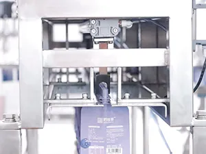 Spouted Pouch Filling and Capping Machine